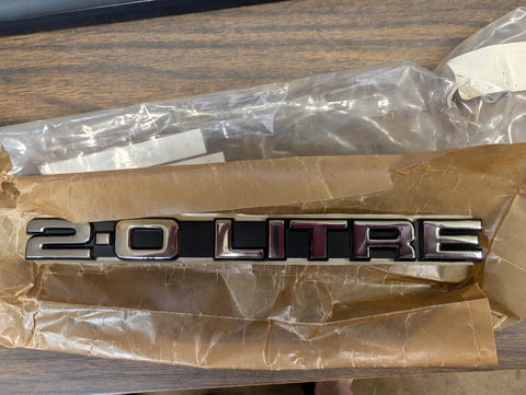 # BHH 2488 Fender Emblem, Front, 2.0 Litre -NOS-